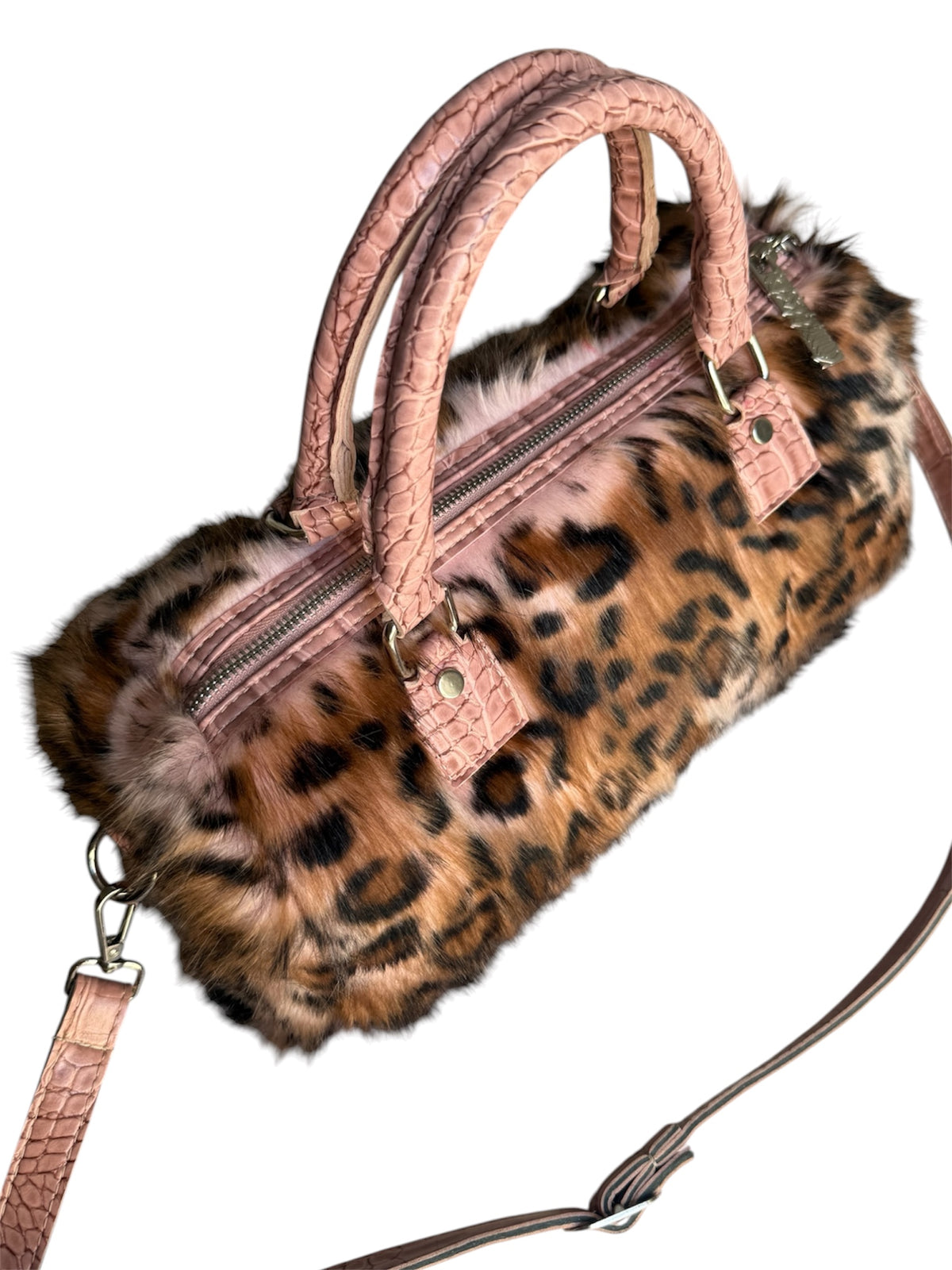 Do you know what else is pink inside? Silver Sausage Duffle Bag