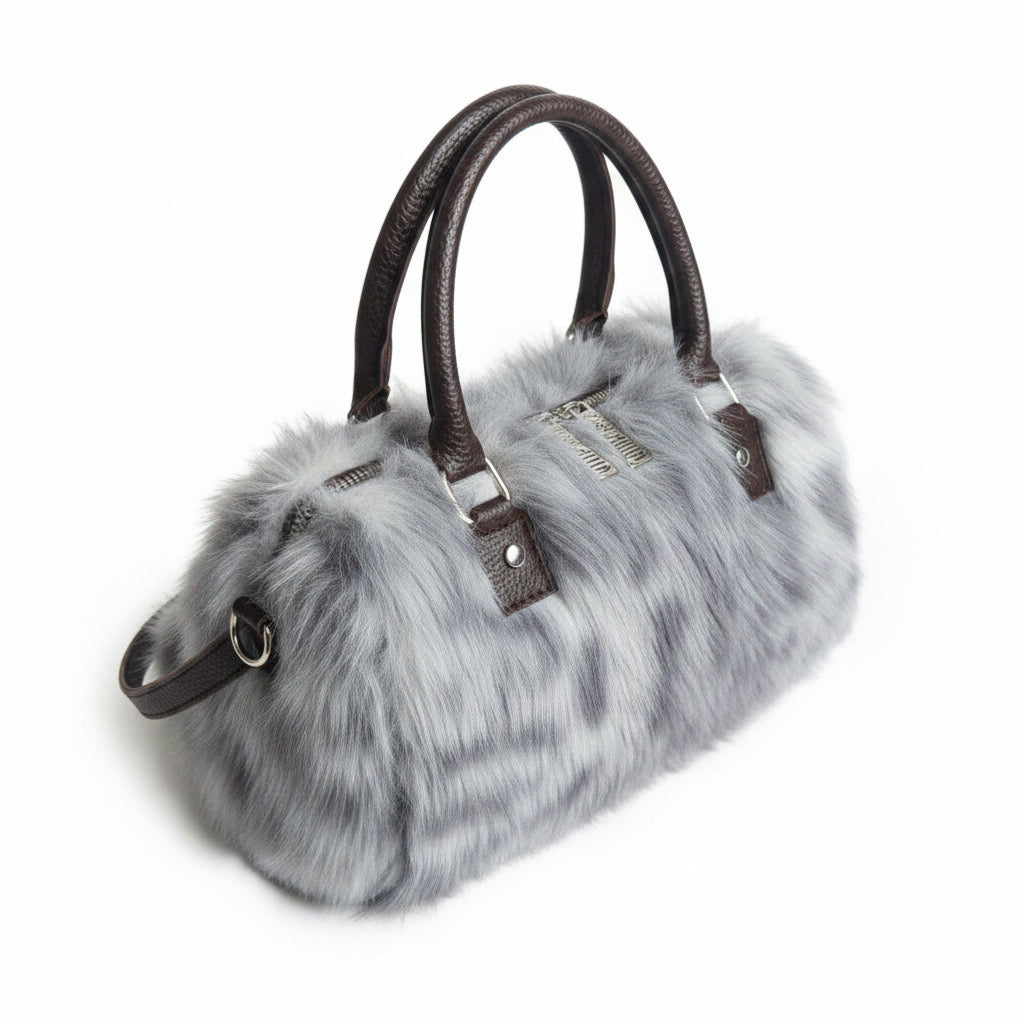 THE NEW SNOW LEOPARD DUFFLE BAG