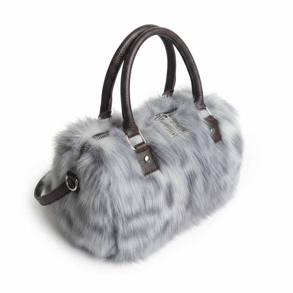 THE NEW SNOW LEOPARD DUFFLE BAG - WEAR SNOW ON YOUR WRIST NOT IN YOUR NOSE
