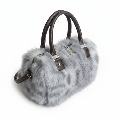 THE NEW SNOW LEOPARD DUFFLE BAG - WEAR SNOW ON YOUR WRIST NOT IN YOUR NOSE