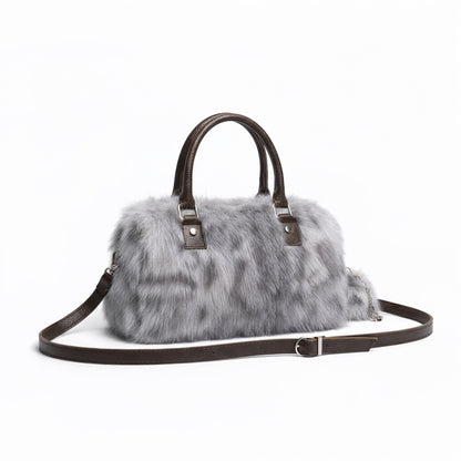 THE NEW SNOW LEOPARD DUFFLE BAG - WEAR SNOW ON YOUR WRIST NOT IN YOUR NOSE