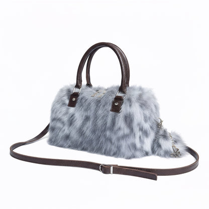 THE NEW SNOW LEOPARD DUFFLE BAG - WEAR SNOW ON YOUR WRIST NOT IN YOUR NOSE